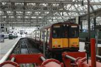 A service to Newton stands at platform 7 of Glasgow Central on 27 July 2009 with 314201 facing the buffers.<br><br>[John McIntyre 27/07/2009]