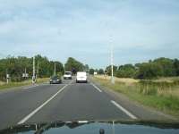 Level crossing across the busy D660 trunk road to the east of Arcachon, for a single track local line.<br><br>[David Pesterfield 20/07/2009]