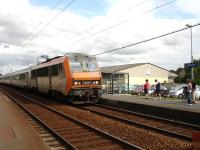 Bo-Bo Electric 26029 enters Carentan Station on 23 July to form the 16.41 departure to Cherbourg<br><br>[David Pesterfield 23/07/2009]