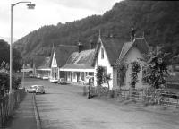 Strolling down towards Callander station on the descent from Ancaster Road bridge on a fine September afternoon in 1965, stopping occasionally to admire the view and leaving just enough time for tea and a bun at the station's pavement cafe before the train arrives....   Looking west with the C&O line heading off towards Loch Lubnaig and Strathyre. This area is now occupied by the town's main car park.<br>
<br><br>[Colin Miller /09/1965]