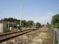 Level crossing and station at St. Antoine de Breuilh on Sarlat/Bergerac to Libourne branch.<br><br>[David Pesterfield 21/07/2009]