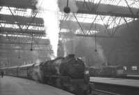 Stanier Black 5 no 45492 waits at a gloomy Edinburgh Princes Street station platform 6 in 1965 with the 1.20pm train to Lanark. In the background a Clayton stands at platform 3 with the 2.05pm train for Carstairs and Manchester.<br><br>[K A Gray 03/09/1965]