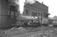 Ex-GWR Castle class 4-6-0 no 5036 <I>Lyonshall Castle</I> stands alongside the Old Oak Common coaling stage in August 1961.<br><br>[K A Gray 21/08/1961]