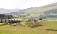 A Freightliner class 66 heading south with a coal train on the approach to Abington on 5 August 2009.<br><br>[John Furnevel 05/08/2009]