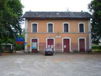 Velines disused station building frontage and car park. Libourne - Bergerac - Sarlat branch.<br><br>[David Pesterfield 13/07/2009]