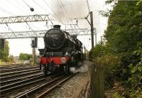 In a 20 minute period during the morning 'rush hour' at Preston on 5 August 2009 there were two steam hauled railtour departures. The first was <i>The Welsh Mountaineer</i> to Blaenau Ffestiniog which is seen here with 45231 at the helm as it approaches the Ribble Viaduct just south of Preston station.<br><br>[John McIntyre 05/08/2009]