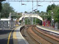 The station and junction at Dalreoch, looking west on 2 June 2009. To the left is the route to Helensburgh and to the right the Balloch branch.<br><br>[David Panton 02/06/2009]