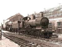 Ex-GWR <i>Dukedog</i> no 317 <I>Earl of Berkeley</I> stands in the aftermath of a snowfall at the Great Western Society depot, Didcot, on 17 February 1985.<br><br>[Peter Todd 17/02/1985]