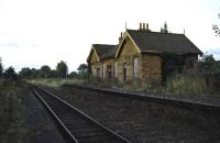 In 2009, 'the railway' returned to the former Midland and Great Northern station at Whitwell & Reepham in the shape of a new heritage centre [see image 36152]. This photograph shows the station at dusk on September 29th 1979, some 20 years after closure to passengers and 4 years prior to complete closure of the line.<br><br>[Mark Dufton 29/09/1979]