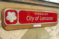 One of three Pendolino <I>City of Lancaster</I> plates originally cast, this was presented to Lancaster City Council by Virgin Trains on 16th July 2004 and is displayed on the main staircase at Lancaster Town Hall. The other two plates are of course on Pendolino No. 390035 itself. <br><br>[Mark Bartlett 07/08/2009]