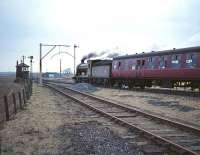 Scottish Rambler no 3 seen shortly after leaving Airth station on 30 March 1964. Airth signal box is on the left and ahead lies Alloa Junction.<br><br>[Robin Barbour Collection (Courtesy Bruce McCartney) 30/03/1964]