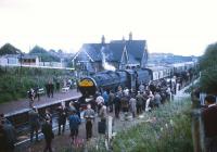 Stanier 8F 2-8-0 no 48033 with the LCGB <I>Two Cities Limited</I> railtour of 23 June 1968. The train is seen during a photostop at Sankey station on the west side of Warrington on its way from Liverpool to Manchester. <br>
<br><br>[Robin Barbour Collection (Courtesy Bruce McCartney) 23/06/1968]