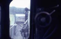 View from the cab of Black 5 No. 44874 as it makes its way back to Lostock Hall after the last steam trip up the Longridge branch to Ribbleton with coal traffic for the Courtaulds plant. The loco is crossing the old Lancaster canal bridge prior to rounding the curve by Maudlands Goods Depot to join the mainline just north of Preston station. For a modern day view of this location [see image 19715]. I had talked my way on board for this journey on the Friday prior to the last weekend of BR Steam. <br><br>[David Hindle 02/08/1968]