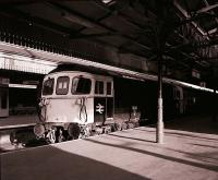 33102 waits with a train in the shadows of platform 4 at Salisbury station on 18 January 1983<br>
<br><br>[Peter Todd 18/01/1983]