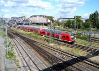 Hamburg to Lubeck train approaching its destination in July 2009. Lubeck is famous for its seven church steeples, three of which can be seen in the background of the photograph.<br><br>[John Steven /07/2009]