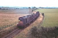 The Langholm/Newcastleton freight (but not quite the last one!), complete with additional brakevan and passengers, photographed shortly after leaving Canonbie on its way to Langholm in August 1967 .  <br><br>[Bruce McCartney /08/1967]