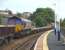 66 173 and 66 047 at either end of a short PW train standing at Kinghorn on Sunday 14 June. Hard against it is the end of a much longer, ballast train.<br><br>[David Panton 14/06/2009]