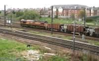 A southbound PW train takes the York station avoiding line at Water End Bridge on a wet Sunday morning in April 2009 behind EWS 66106.<br>
<br><br>[John Furnevel 19/04/2009]