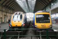 Trains for London Kings Cross and Manchester Piccadilly preparing to leave Hull on 23 April 2009.<br><br>[John Furnevel /04/2009]