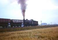 J37 no 65811 with a train of coal empties returning from Blyth's twin power stations running between Freemans Crossing and Winning Junction in the 1960s.<br>
<br><br>[Robin Barbour Collection (Courtesy Bruce McCartney) //]