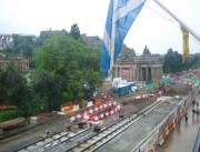 Looking west through the rain over Princes Street on 14 August 2009 with tram works well advanced. On the horizon to the left is the north stand built above the Castle Esplanade to accommodate visitors to the 2009 Edinburgh Military Tattoo.<br><br>[F Furnevel 14/08/2009]