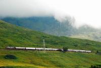 The Royal Scotsman heads south from Gorton. It is being led by a 47 with a 37 in the rear. The train is skirting Beinn a Chreachain with Beinn Achaladair beyond.<br><br>[Ewan Crawford 08/08/2009]