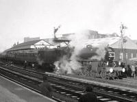 61278 stands at Kilmarnock on 3 December 1966 with the BR (Scottish Region) <I>Last B1 Excursion</I> from Edinburgh. The train continued over the G&SW to Carlisle, returning home via the Waverley route. Built by the North British Locomotive Company in Glasgow in 1948, no 61278 was withdrawn from Dundee, Tay Bridge shed in April 1967 and cut up at Arnott Young, Carmyle, in January of 1968.<br>
<br><br>[Bruce McCartney /12/1966]