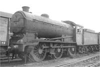 Ex-LNER J39 0-6-0 no 64733 awaiting scrapping at Cowlairs in July 1962, having been withdrawn from Carlisle Canal shed 9 months earlier and arrived here via Eastfield [see image 45637].<br><br>[Ken Browne 08/07/1962]