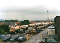 Intense Marcroft repair and dismantling activity on aggregate wagons in Horbury Bridge Goods Yard in June 1997. The yard stood on the south side of the line to Healey Mills and across Bridge Road from the former Horbury & Ossett Station. <br><br>[David Pesterfield 25/06/1997]