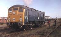 The last Class 24 <I>Skinhead</I> in mainline service was 24081. Withdrawn in 1980, after a working life of just over 20 years, it has now been in preservation for over 30. Here it is at Steamport in Southport, its first home, at a special open day. Steamport was based in the old steam shed but later closed with operations being moved to the Ribble Steam Railway at Preston although 24081 now resides on the GWR at Toddington. <br><br>[Mark Bartlett 11/09/1982]