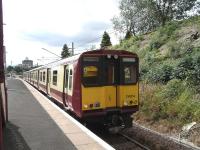 314 214 picks up speed as it approaches the end of the long platforn at Shawlands with a Circle train back to Glasgow Central on 8 August 2009.<br><br>[David Panton 08/08/2009]