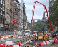 Edinburgh Trams progress. Pouring cement on Princes Street, 18 August 2009.<br>
<br><br>[Bill Roberton 18/08/2009]