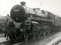 73062 of Polmadie shed seen at Eastfield circa 1961 following an overhaul at Cowlairs Works. Notice the fireman putting in a surprise appearance from below the locomotive.<br><br>[Ken Browne //1961]