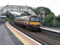 320 312 arrives at Westerton with a service to Balloch on 8 August 2009<br><br>[David Panton 08/08/2009]