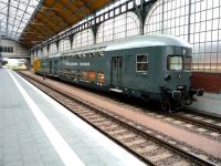 A pair of vintagedouble decker carriages, used on special occasions, standing in the corner of Lubeck Station in July 2009. The vehicle nearest the camera carries the name <I>Lisa Drager</I>, a leading patron of the reconstruction ofLubeck'sGothic churches and other historic buildings damaged during World War II. She is also one of the strongest supporters of scholarshipsat the International School of New Media at the University of Lubeck.<br><br>[John Steven /07/2009]