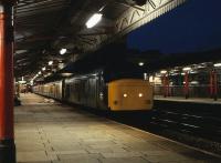 45106 calls at platform 2 of Newport station on 6 November 1982. Note the mailbags being transferred.<br>
<br><br>[Peter Todd 06/11/1982]