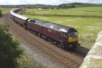 Northbound 47 804 passing the site of Lumphinnans Central Junction with <I>The Royal Scotsman</I> on 24 August.  The Cowdenbeath (Old) branch diverged to the left here.<br><br>[Bill Roberton 24/08/2009]