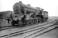 61600 at Darlington shed during its brief erroneous stopover in July 1958. David Whittaker recalls...  <I> 61600 'Sandringham' caused something a a stir amongst the local enthusiast population by arriving at Darlington in the summer of 1958 (although it appears to have been consigned there by mistake and was later sent on to Doncaster to be scrapped). On first hearing the news of 61600's arrival I mounted my trusty Triumph Palm Beach and furiously pedalled the nine miles, scouring the Darlington shed and works areas, but alas too late!</I> [See image 25149]<br>
<br><br>[Robin Barbour Collection (Courtesy Bruce McCartney) 12/07/1958]