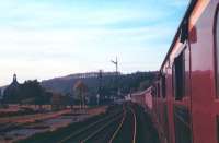 The morning train south from Edinburgh approaching Newcastleton behind a <I>Peak</I> Type 4 diesel in December 1968 under a weak winter sun.<br><br>[Bruce McCartney /12/1968]