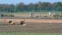 Two parallel east coast mainlines running past Dolphingstone, near Prestonpans, on 9 May 2003. The nearer one is the replacement alignment and the other was the line replaced due to mining subsidence in the area.<br><br>[Ewan Crawford 09/05/2003]