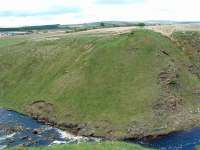 Just west of Muirkirk the Muirkirk Waggonway crossed the Garpel Water. This view looks north east towards Muirkirk at the site of the bridge. Further north the Glasgow and South Western line crossed over the stream and further north still the NCB Wellwood line crossed the stream.<br><br>[Ewan Crawford 25/05/2003]