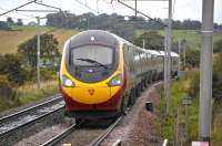 A Glasgow Central - London Euston Pendolino approaching Carluke on 31 August 2009<br><br>[Bill Roberton 31/08/2009]