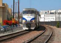 AMTRAK F59PHI no 459 has just received the all clear to run south over Cedar Street crossing in San Diego, CA on 15 August 2009. The train will shortly enter the Santa Fe Depot where it will form the northbound <I>Pacific Surfliner</I> service #577, the 1255 to Los Angeles.<br><br>[Andy Carr 15/08/2009]