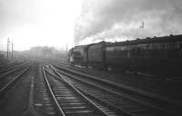Stanier <I>Coronation</I> Pacific no 46237 <I>City of Bristol</I> takes the up <I>Royal Scot</I> out of Carlisle on a dull and overcast day in December 1963.<br><br>[Robin Barbour Collection (Courtesy Bruce McCartney) 28/12/1963]
