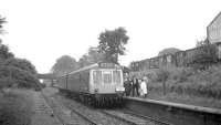 The LCGB <I>Makerfield Miner</I> special calls at Ashton-in-Makerfield on a photostop in August 1968. The station had been closed to scheduled passenger services since 1952 although it continued to be used as late as 1975 to handle excursion traffic in connection with the nearby Haydock Park racecourse. This section of the line closed completely in 1991 and the station site has since been cleared and landscaped. The area now forms part of a business park.<br><br>[K A Gray 24/08/1968]