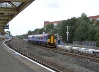 156 499 calls at Kilmarnock platform 4 on a service to Carlisle on 2 September 2009. Platform 3 is normally used by trains in both directions unless services are crossing or close to crossing, as in this case.<br><br>[David Panton 02/09/2009]