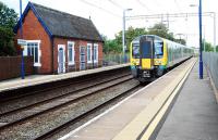 A London Midland service passing non-stop through Barlaston on its way south.<br><br>[Ewan Crawford 10/09/2009]