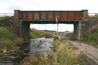 Significant flooding affecting the trackbed running through bridge 38 at Westcraigs on 28 August 2009. View is west towards Forrestfield where work is in progress in the distance.<br><br>[John Furnevel 28/08/2009]