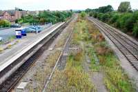 Honeybourne looking to Worcester. The disused island platform divides the OWW on the left from the connection to the GWR route from Cheltenham to Birmingham. The latter route is retained as a stub here serving an MOD establishment at Long Marston with a connection behind the camera operated by ground frame.<br><br>[Ewan Crawford 05/09/2009]
