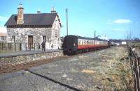 A pleasant Saturday morning at Earlston as the Branch Line Society <i>Scott Country Rail Tour</i> pulls away from the platform and heads for Greenlaw on the outward journey. <I>Glen</I> 4-4-0 no 62471 <I>Glen Falloch</I> is  in charge and the date is 4 April 1959. [See image 25330] <br>
<br><br>[John Weatherley Collection (Courtesy Bruce McCartney) 04/04/1959]